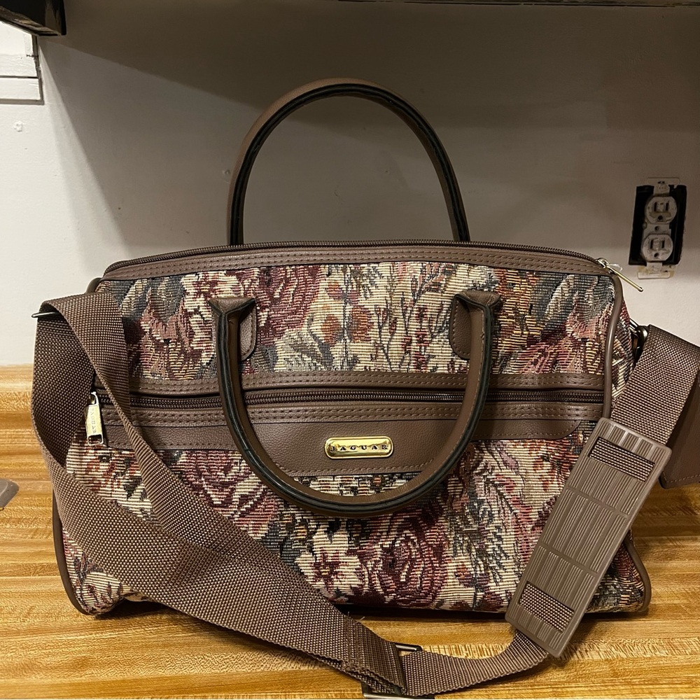 Jaguar Brown Travel Bag with Floral Pattern and Gold Accents